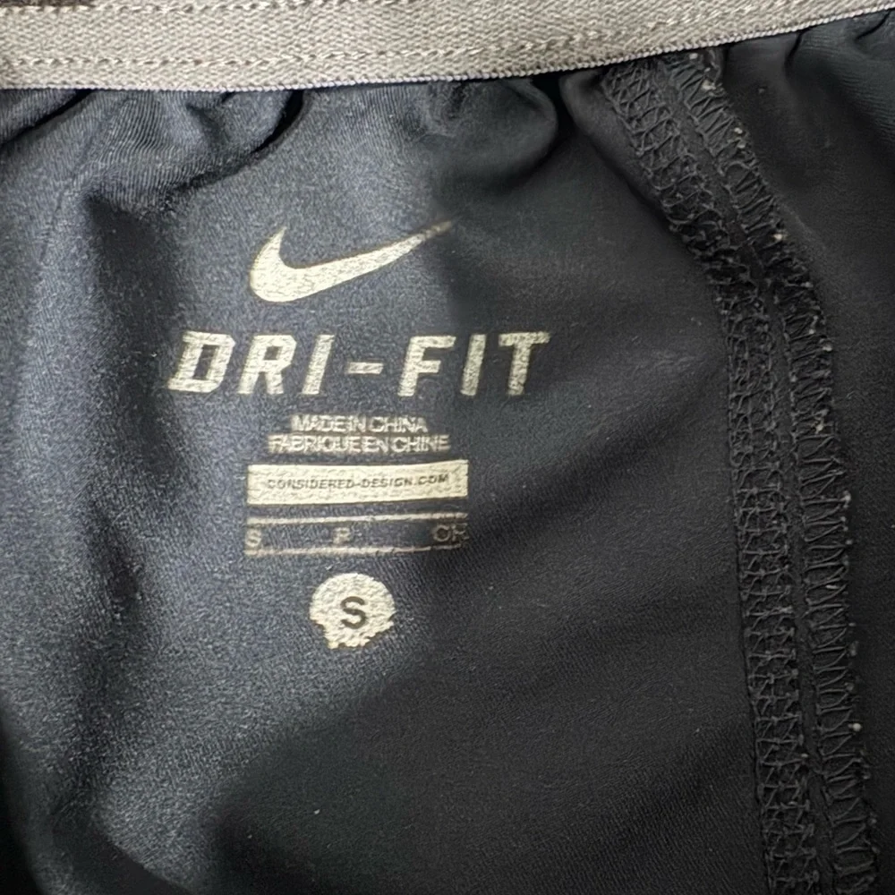 Nike Dri-FIT Performance track pants with Silver Logo